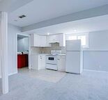 1-Bed, 1-Bath leads to a Cozy Basement Suite.