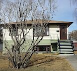MAIN FLOOR TWO SPACIOUS BEDROOMS BRIGHT RAISED BUNGALOW
