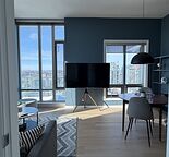 Luxury High-Rise Condo with Panoramic Downtown Views — Bright & Modern