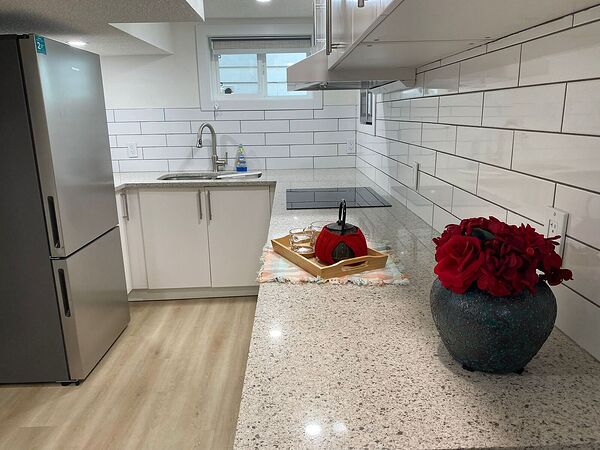 Newly Furnished 2BR Inner-City Suite in W Hillhurst | Private Kitchen | Near DT