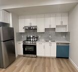Modern and Brand New  Legal Suite + 9ft Ceilings | Steps to NEW Village!