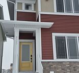 Welcome to this beautifully appointed semi-duplex at 8593 Huxbury Drive NE Calga