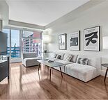 Large Modern Apartment, pristine view of the Bow River. Walkability 10