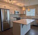 Bright Corner 2 Bed + Den Condo in Sage Hill | 2 Parking Stalls | Available June