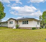 Spacious 2 Bedroom Main Floor Home w/ Oversized Garage & Yard