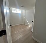 Modern Brand New 1 Bedroom + a Den Basement Suite in Creekview - SW Calgary
