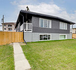 Bright 3 Bedroom Main Floor Unit Across from Green Space in Bowness