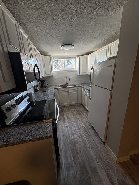 Calgary 1 + Den bedrooms Fourplex for rent. Property photo: 743463-3