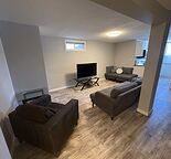Spacious 1 Bedroom + Den Furnished Basement Suite | Pet Friendly