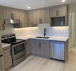 Three bedroom basement suite Acadia