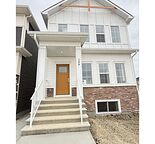Brand-New 4 Bed + 3.5 Bath Home w/ Fully Developed Basement Suite — 308 Huxbury