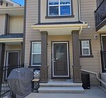 Cozy 2 bedroom townhouse with 2 car tandem garage.