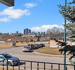 Great 2 Bedroom Main Floor with Downtown Views- Balcony