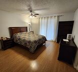 2 large furnished private rooms (1 w bath), on shared main floor