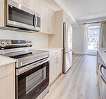 Move-in ready 2br Main Floor unit w Underground Parking, Heat Water, near Bus 79