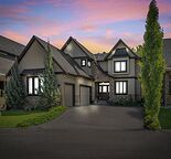 Executive 5-Bedroom Estate Home Backing onto Forest — Rocky Ridge NW