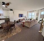 Bright, All-Inclusive 1 Bedroom + Large Den Condo Steps from Somerset LRT