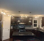Front garage family living in well maintained, close to all amenities, and bus.