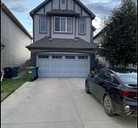 Front garage family living in well maintained, close to all amenities, and bus.