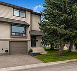 Pristine 2 Bedrooom Townhome Condo with small yard