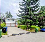 House with 3 beds, 3 full Bath, double garage on quiet street