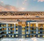 MODERN 2 BED + 2 BATH MAIN FLOOR CONDO WITH UNDERGROUND PARKING IN SETON