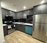 ? Walden SE | Brand New Legal Basement | 1 Bed + Large Den