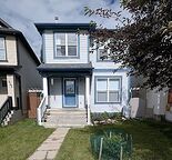 Family home with big backyard, double garage and finished basement