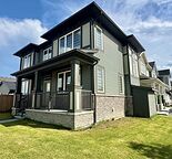 Spacious 3 Bedroom Main Floor Home with Double Garage & Large Fenced Backyard