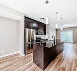 Modern 2.5-Bedroom Townhouse with Loft, Den & Double Garage – Located in Skyview