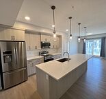 Modern 2 Bed, 2 Bath Condo| Heated Underground Parking| A/C| Prime Harvest Hills