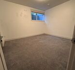 Spacious basement room in community‑minded household. Close to SAIT and UofC