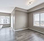 Top-Floor Corner Unit! 2 Bed + Den, 2 Bath Condo with Mountain Views