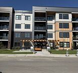 Luxury Apartment 2BR/2BA — Heated Floors, In‑Suite Laundry & Wolf Willow Nature