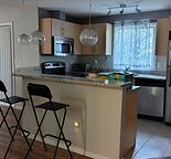 End unit 2 bedroom 2 bathrooms condo with fireplace and a large balcony on 2/F