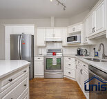 Fully Furnished 2 Bedroom + Den Condo in the Heart of Hillhurst