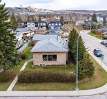 2 BED BASEMENT WITH HEATED GARAGE IN BOWNESS