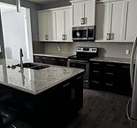 3+den 21/2 bath furnished with open concept kitchen
