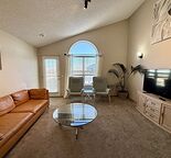 Coventry Hills 3BR/2BA Main Floor Furnished Suite with Double Car Garage