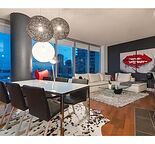 Arriva, 9th Floor, spacious nearly 1000sf 1-bedroom suite dazzles with floor-to-ceiling south-facing windows, framing ja