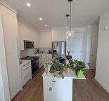 Modern 2 Bedroom + Den Condo with Underground Parking in Skyview Ranch (IP059)