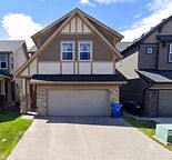 Executive Living in Cougar Ridge — Spacious 5 Bdr Home with AC and Basement