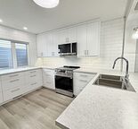 Fully Renovated 4 Bedroom Duplex, Oversized Garage, Sunny Corner Lot
