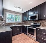 5 bedroom 2 bath home with suited basement (included) across from the park