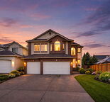 Executive two-storey home with a triple attached garage