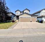 Large Furnished Home with triple Garage backing onto a pond