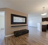 Cozy 2 bedroom, balcony faces quieter interior of complex