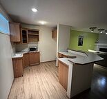 Large 1 Bedroom + 1 Den Basement, Living Room, Bath - Bridlewood SW