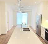 Brand-New 3-Bed 2 Bath Condo for Rent in Wolf Willow SE, Heat & Water Included