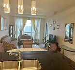 20th Floor 1 Bed + Den Condo – South Views & Direct LRT Access!